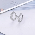 Detailed close-up of silver star earrings with pave set zircon crystals and hoop closure - Star Pave Hoop Earrings-Platinum Color