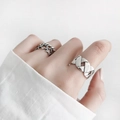 Minimalist S925 sterling silver braided open rings for women on hand with white background - Adjustable Open / Silver Woven Style
