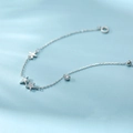 Armband aus 925er Silber mit polierten Seestern-Anhängern und funkelndem Zirkonstein - Silber (Universum-Sternenhimmel-Stil)