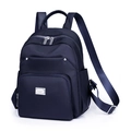 Minimalist navy blue nylon backpack with multiple pockets and silver hardware for women - Royal Blue