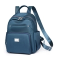 Navy blue nylon backpack for women featuring multiple zipper pockets and a minimalist design - Teal