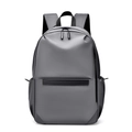 Front view of grey waterproof business backpack with black zipper details and side pockets - Simple Grey