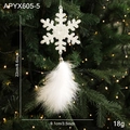 White feather snowflake angel ornament hanging on a Christmas tree with warm lights - Snowflake Feather Style