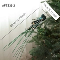 Peacock Christmas bird ornament with green glitter wings and rhinestones on a festive tree - Green Flying Bird
