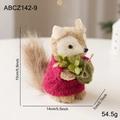 Handcrafted straw squirrel Christmas figurine wearing a pink sweater and carrying greenery - Flower Basket Squirrel