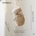 Beige kersthandschoen hanger met gouden lovertjes en amberkleurige steen, 10cm decor - Handschoen Stijl