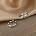 S925 sterling silver Mobius twist hoop earrings with sparkling cubic zirconia accents - Geometric Sparkle Earrings / Silver