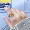 Detailed view of irregular golden thorn ring worn on finger with artistic branch design - Thorn Branch Entwined Style (R1039)