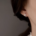 925 silver retro daisy hoop earrings featuring small flower design on female model - Minimalist Five-Petal Flower Ear Buckle-Platinum Color