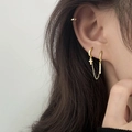 Close-up of gold chain earrings for double piercings with a zircon cross and ear cuff - Double Piercing Chain Cross (Gold) / Gold