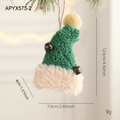 Cappello di Natale verde in peluche con campanelli e bordo in ecopelliccia sull'albero - Cappello di Peluche Verde