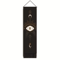 Close-up of bohemian wall tapestry with golden eye of providence and moon moon motifs - 32.5x130cm / Eye of Providence Zodiac (Black)