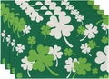 Close-up of four-piece green linen table mats with St. Patrick's Day clover patterns - Full Print Clover Style
