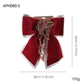 Red velvet Christmas bow with silver trim and festive ribbons for tree decoration - Large Wine Red Bow
