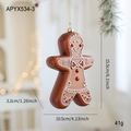 Brown plastic gingerbread man Christmas ornament with white wavy lines and a gold string - Gingerbread Man Style B