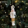 White and gold Nutcracker Christmas ornament with glitter, 16cm height on tree branch - Soldier Style