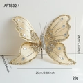 Farfalla decorativa in tessuto oro champagne con glitter e strass su clip in metallo - Oro