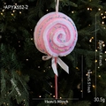Pink and white lollipop Christmas ornament with glitter and bow on tree branch - Pink Lollipop