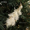 Golden peacock Christmas ornament with white feathers on festive tree branches - Gold