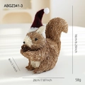 Christmas squirrel ornament made of natural sisal with red hat holding a pine cone, 16x20cm - Squirrel