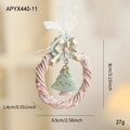 Pink resin Christmas wreath ornament with green tree and gold bow detail, 8cm height - Pink Garland