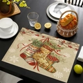 Linen Christmas placemat with colorful stockings and pine needles on a table - Three Stockings Vintage Style / 30*45cm