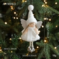 White plush Christmas angel girl ornament with silver wings hanging on a warm lit tree - White Angel Pendant