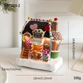 Leuchtendes Lebkuchenhaus aus Harz mit LED-Licht und Pfefferkuchenmann-Figur - Lebkuchenmann Laden Spieluhr (AAA Batterie)