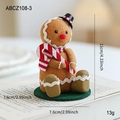 Gingerbread man plush ornament with red scarf and top hat, height 11cm on book scene - Gingerbread Man With Black Top Hat