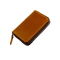 Detailed close-up of brown genuine leather texture and stitching on zipper key pouch - Brown