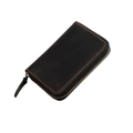 Detail of genuine leather keychain pouch with vintage texture and orange hand-stitched seams - Black