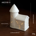 White ceramic light-up Christmas house with warm LED glow and hollow windows, 14.5cm height - Ceramic Ornament Style D(ABCZ100-12)
