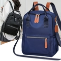 Wasserfester Nylon-Rucksack in Blau und Schwarz mit vielseitigen Tragemöglichkeiten - Blau