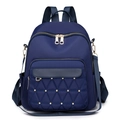 Navy blue Oxford cloth backpack with quilted triangle pattern and gold rivets for women - Blue