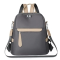 Mochila de tela Oxford gris con adornos de cuero y correas ajustables en fondo blanco - Gris