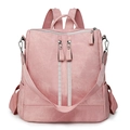 Minimalist light pink textured leather backpack for women with dual zippers and woven strap - Pink