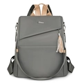 Zaino da donna in nylon grigio scuro impermeabile con manici marroni e ciondolo con nappe - Grigio