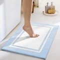 Plush blue and white rectangular bathroom mat with soft absorbent flocking texture - Light Blue
