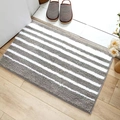 Absorbent grey and white striped bathroom mat with soft plush texture on wooden floor - 45x65cm / Striped Grey