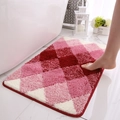 Plush bathroom mat with red and pink diamond pattern on white marble floor - Medium / Garnet Red