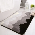 Pluche badkamermat met grijs en zwart golfpatroon en een antislip onderkant - 40x60cm / Prachtige Bergen-Grijs