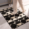 Zerbino geometrico in bianco e nero in polipropilene con fondo antiscivolo moderno - 50x80cm / Yoserin (Nero e Bianco Geometrico)