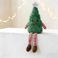 Detailopname van een pluche kerstboompop met gestreepte lange benen op een witte tafel - Groene Kerstboom Pop Ornament