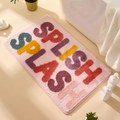 Tappeto da bagno rosa assorbente con scritte Splish Splash per sicurezza domestica - Splish Splash (Rosa) / 40x60cm