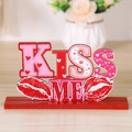 KISS ME wooden Valentine table sign with red glitter accents and heart pattern - KISS Wooden Ornament