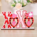 XOXO wooden Valentine table sign with red heart patterns and pink gift topper - XOXO Wooden Ornament