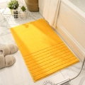 Plush lemon yellow rectangular bathroom mat with textured stripes on marble floor - Lemon Yellow