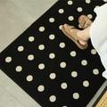 French luxury black polka dot faux wool entrance mat on gray tile floor - Midsummer Black