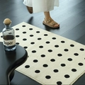 Faux wool entryway rug with black polka dots on cream background for home decor - Midsummer White