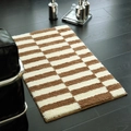 Thick plush checkered bathroom mat in brown and cream on dark wood floor - 40×60CM / Brown